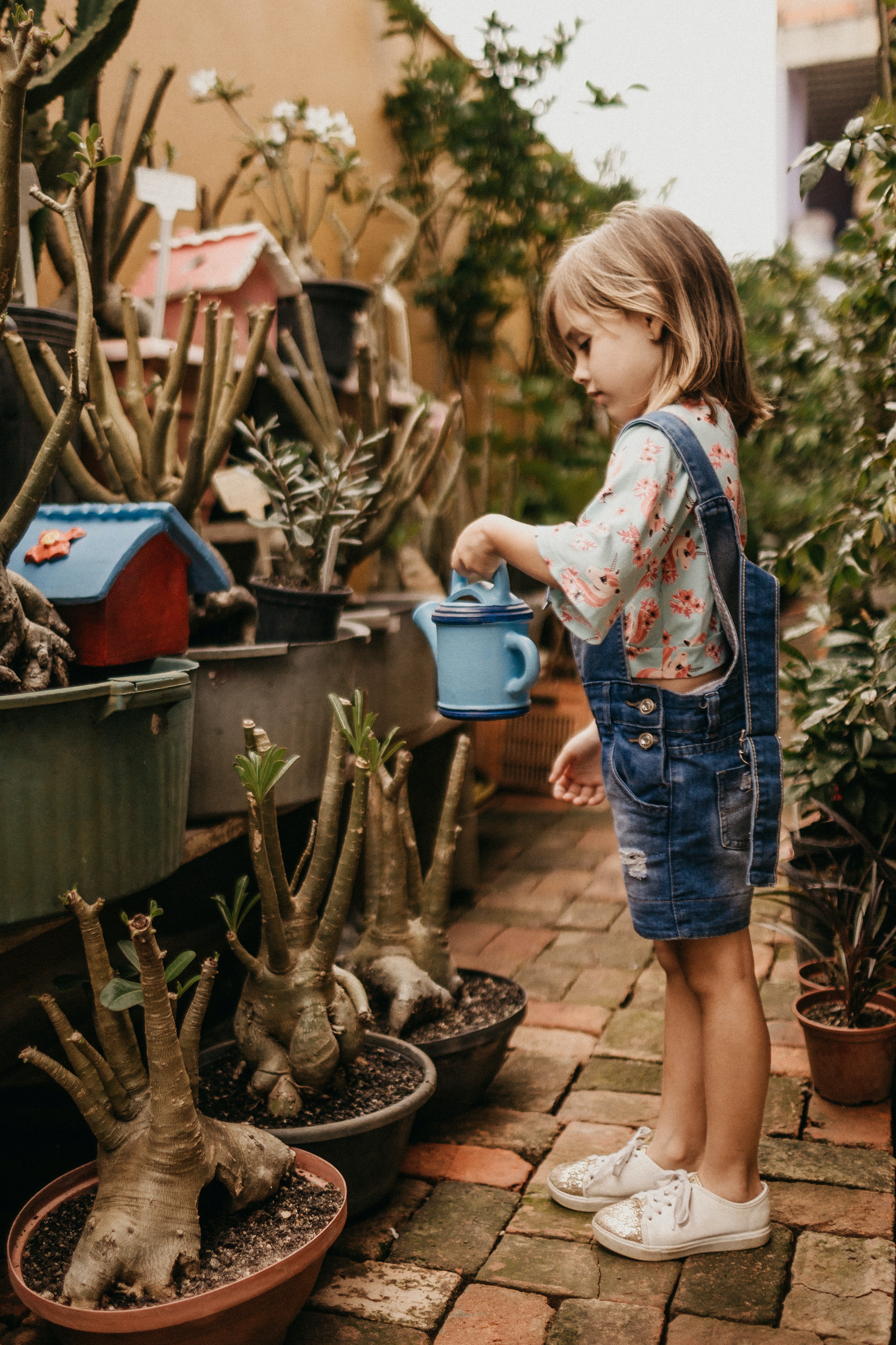A girl watering plants